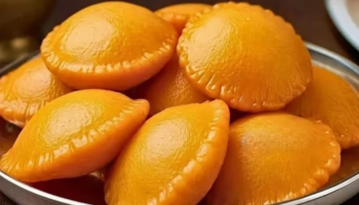 ​পাকা আমের পোয়া পিঠা তৈরির রেসিপি জেনে নিন